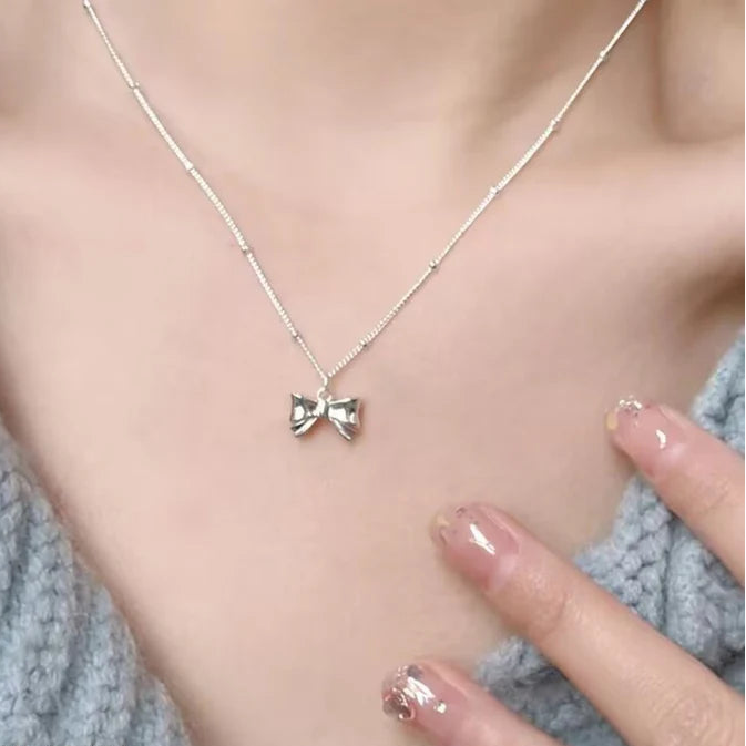 Dainty Silver Bow Charm Necklace